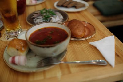 "The typical Russian foods borscht, piroshiki, pickled herring and rye bread."
